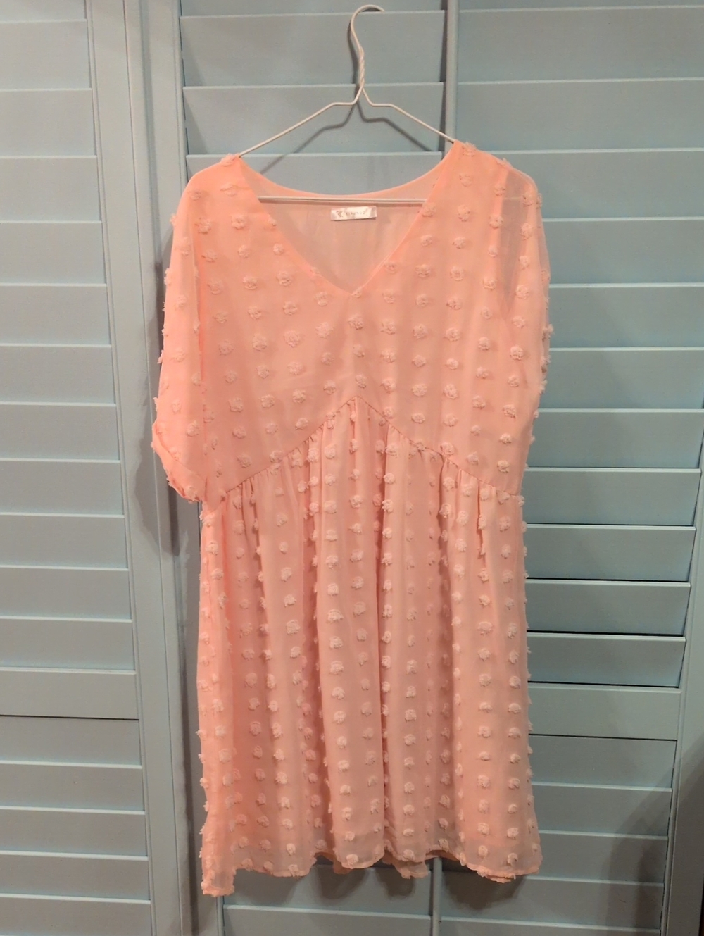 PinkTextured V-Neck Babydoll Dress